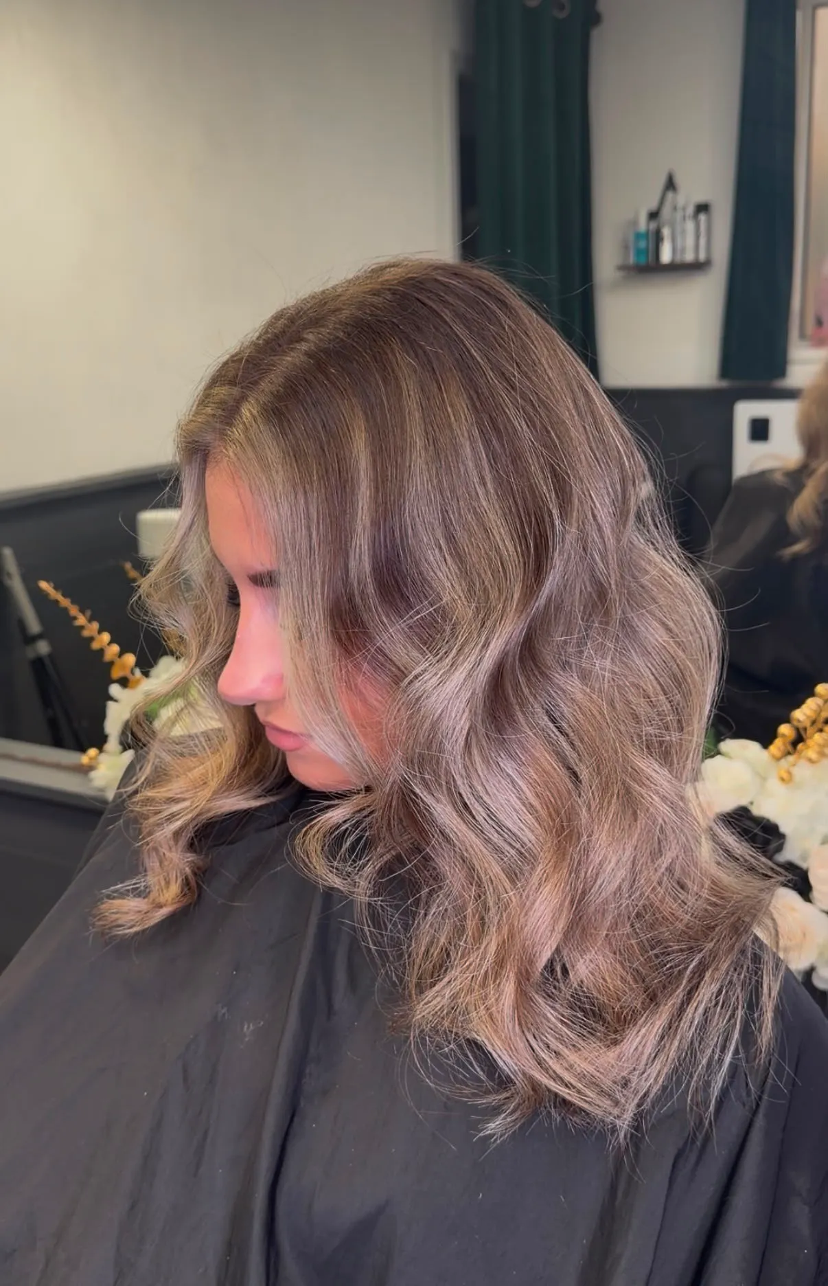 Dimensional brunette-to-blonde waves, profile view