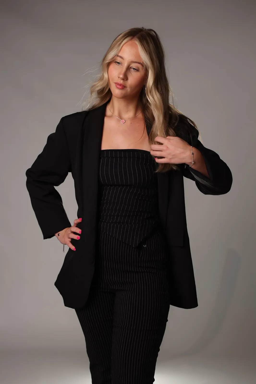 Roxy, founder and stylist at RXY Hair Studio, in her Kingswood studio